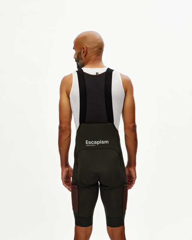 PAS NORMAL STUDIOS Escapism Dark Olive Culotte Ciclismo Hombre