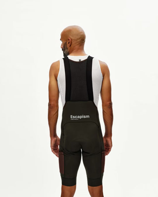 PAS NORMAL STUDIOS Escapism Dark Olive Culotte Ciclismo Hombre